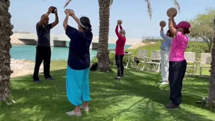 Training with the wooden ball to build stamina and energy